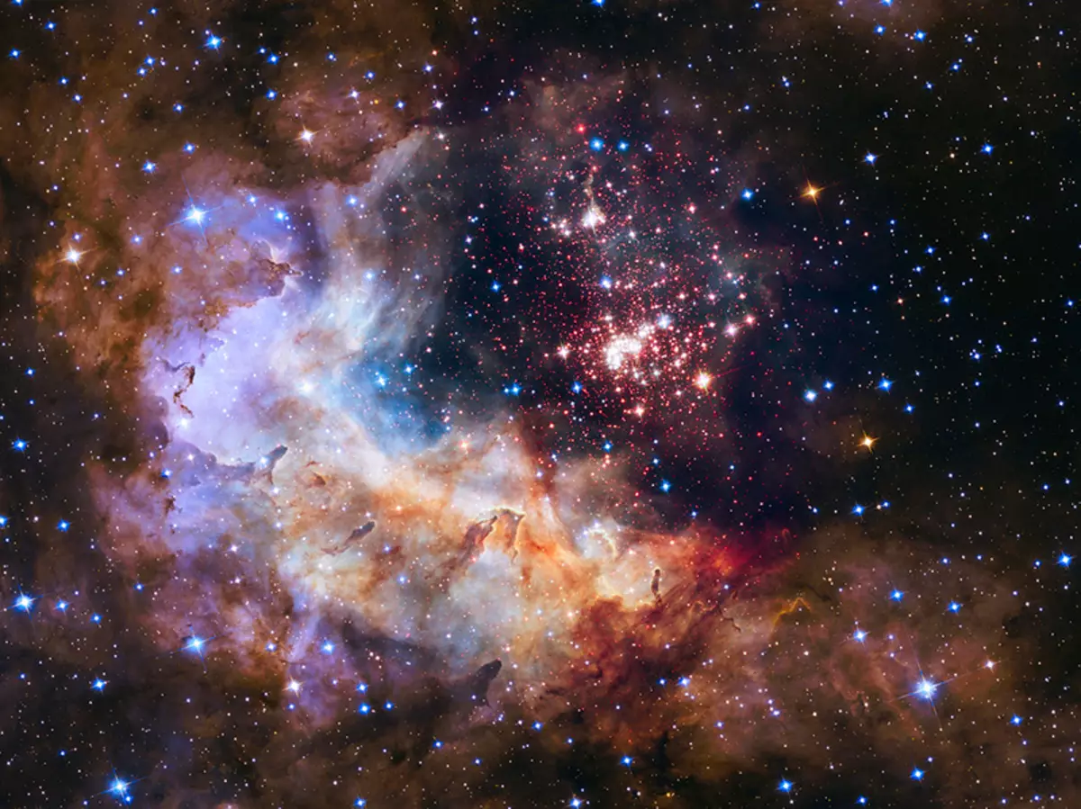 This Nasa / ESA Hubble Space Telescope Image of the Cluster Westerlund 2 and Its Surroundings Has Been Released to Celebre Hubble's 25th Year In Orbit and a Quarter of a Century of New Discoveries, Stunning Images and Outstanding Science. The image's central region, containing the star cluster, blends visible-light data taken by the Advanced Camera for Surveys and near-infrared exposures taken by the Wide Field Camera 3. The surrounding region is composed of visible-light observations taken by the Advanced Camera for surveys.