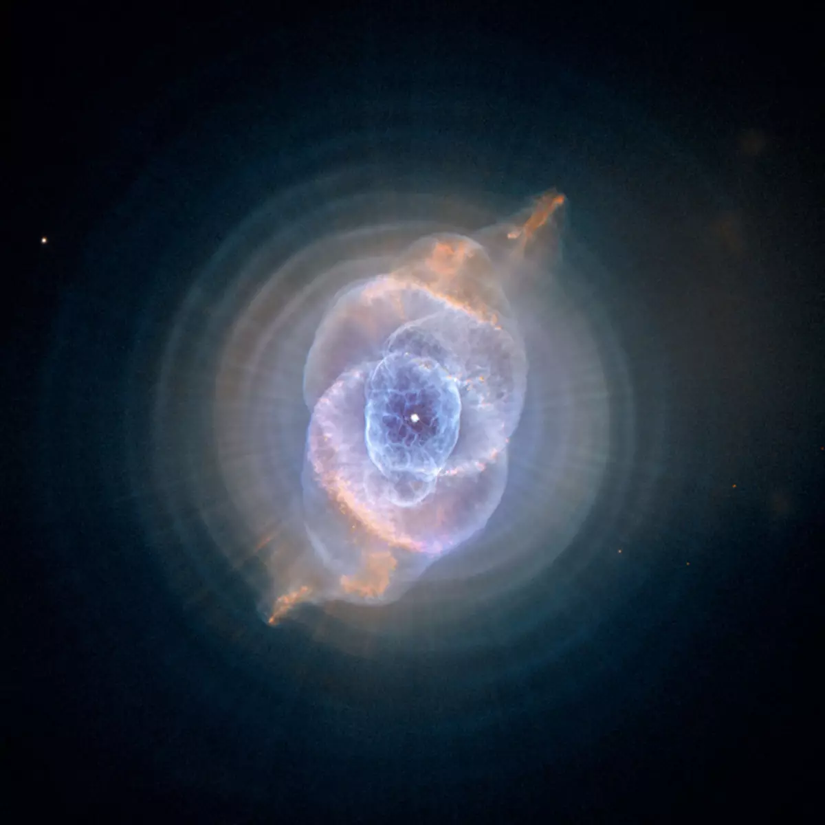 In this detailed view from the NASA / ESA Hubble Space Telescope, the so-called Cat's Eye Nebula looks like the penetrating eye of the disembodied sorcerer Sauron from the film adaptation of